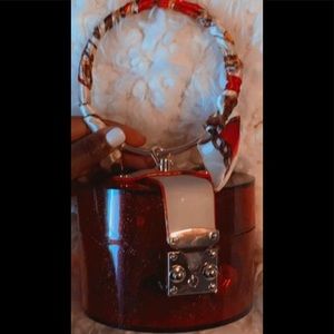 Tasteful Acrylic Circular Handbag